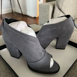 New heels, still in box, never worn!